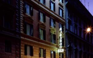 a building with a sign on the side of it at Hotel Igea in Rome