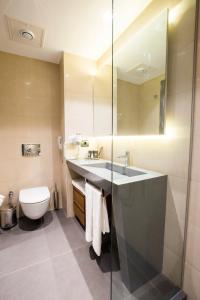 Koupelna v ubytování Zeniva Hotel