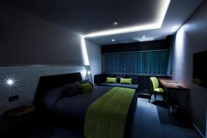 Postel nebo postele na pokoji v ubytování Zeniva Hotel