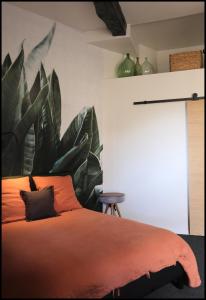 A bed or beds in a room at LeDeN