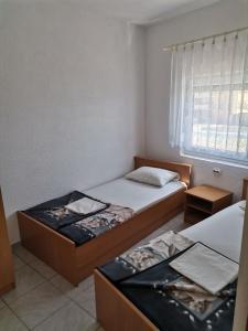 Postel nebo postele na pokoji v ubytování Danijela
