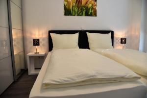 Llit o llits en una habitació de Apartment Aurachtal Münchaurach