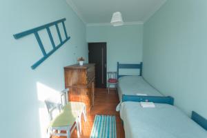Postel nebo postele na pokoji v ubytování Chamich Guesthouse