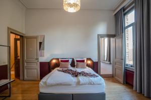 Postel nebo postele na pokoji v ubytování B&B La Corderie