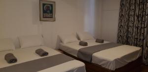 Letto o letti in una camera di Hotel ColdWorld