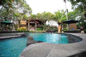 Bazén v ubytování De Munut Balinese Resort nebo v jeho okolí