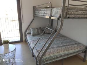 Postel nebo postele na pokoji v ubytování Apartament SomRiu