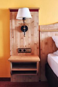 Postel nebo postele na pokoji v ubytování Hotel Paintner
