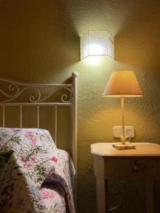 A bed or beds in a room at Casa Rural Macia - Apartamentos