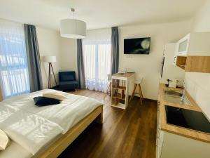Łóżko lub łóżka w pokoju w obiekcie Haus Stadler - Self Check-in