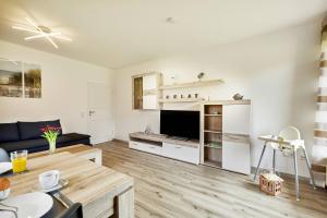 Posezení v ubytování Ferienwohnung Dangasteroase