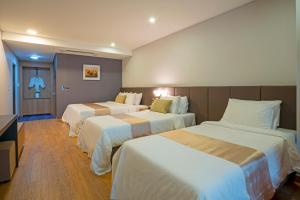 Embledon Hotel客房内的一张或多张床位