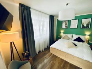Łóżko lub łóżka w pokoju w obiekcie Haus Stadler - Self Check-in