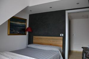 B&B Torre Porta Marina客房内的一张或多张床位