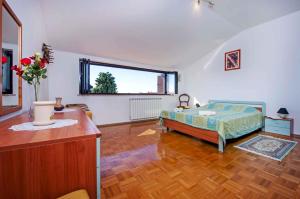 Posteľ alebo postele v izbe v ubytovaní Apartment in Rovinj - Istrien 11720