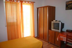 A television and/or entertainment centre at Apartments in Rovinj/Istrien 11700