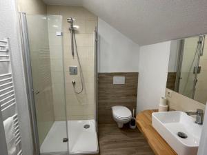 Een badkamer bij Hotel Andrea