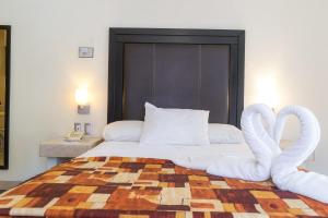 Postel nebo postele na pokoji v ubytování Hotel Posada Guadalupe