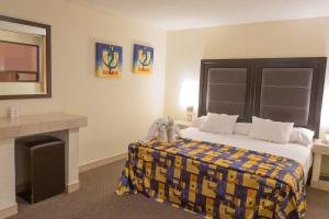 Postel nebo postele na pokoji v ubytování Hotel Posada Guadalupe