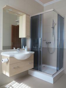 A bathroom at Aura Apartman Még 37 kép