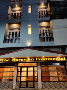 a building with a sign that reads the niagara connection at Hotel The Narayani Continental in Gangtok