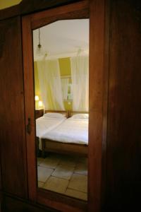 Postel nebo postele na pokoji v ubytování Meliti Guesthouse