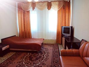 Ein Bett oder Betten in einem Zimmer der Unterkunft Гостиница Фотон