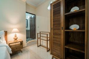 Postel nebo postele na pokoji v ubytování Vaneka Garden House