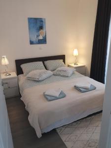 Posteľ alebo postele v izbe v ubytovaní Apartmani Eden Vrsi Mulo