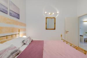 Posteľ alebo postele v izbe v ubytovaní Apartments Riva Lucija by Litto