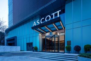 a blue building with a asociologist sign on it at Ascott ICC Guangzhou-Free shuttle bus for canton fair in Guangzhou