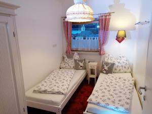 Llit o llits en una habitació de Alpenapartment Abtenau 2 - 6 Personen