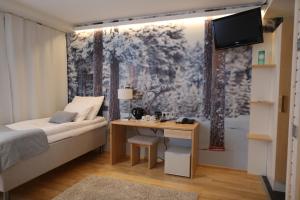 Postel nebo postele na pokoji v ubytování Hotel Ivalo