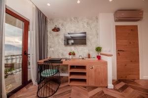 Kuchyň nebo kuchyňský kout v ubytování Barka B'n'B - Elegant Seaview Rooms