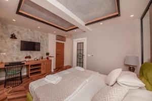 Postel nebo postele na pokoji v ubytování Barka B'n'B - Elegant Seaview Rooms