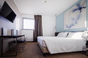 TV a/nebo společenská místnost v ubytování Hotel For You