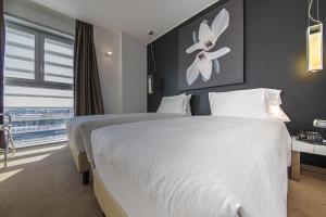 Voodi või voodid majutusasutuse Hotel For You toas