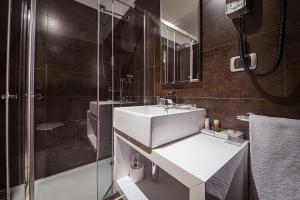 Vannituba majutusasutuses Hotel For You