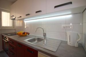 Kuchyň nebo kuchyňský kout v ubytování Apartment Agata in city center