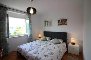 Postel nebo postele na pokoji v ubytování Apartment Agata in city center