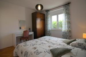 Postel nebo postele na pokoji v ubytování Apartment Agata in city center
