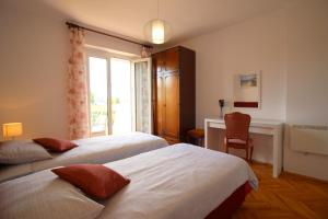 Postel nebo postele na pokoji v ubytování Apartment Agata in city center