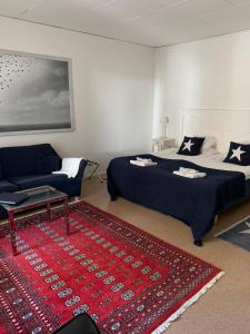 Postel nebo postele na pokoji v ubytování Hotell Kaprifol