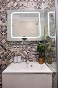 Et badeværelse på Ambient Holiday Apartment Beach resort