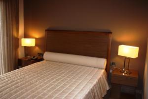 Posteľ alebo postele v izbe v ubytovaní Hotel Cariatis