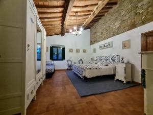 Posteľ alebo postele v izbe v ubytovaní Casarossa, la casa del cuore + 37 fotografií