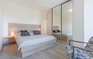 Postel nebo postele na pokoji v ubytování Apartment Belas + 27 fotografií