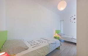 Postel nebo postele na pokoji v ubytování Apartment Belas