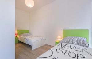 Postel nebo postele na pokoji v ubytování Apartment Belas