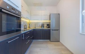 Kuchyň nebo kuchyňský kout v ubytování Apartment Belas